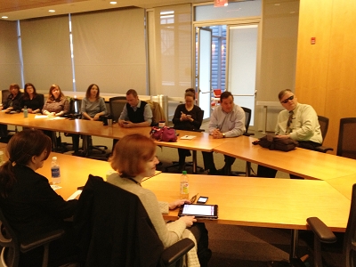 Event Attendees Around Conference Table