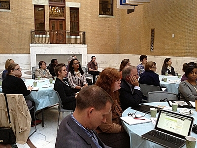 More event attendees seated at tables